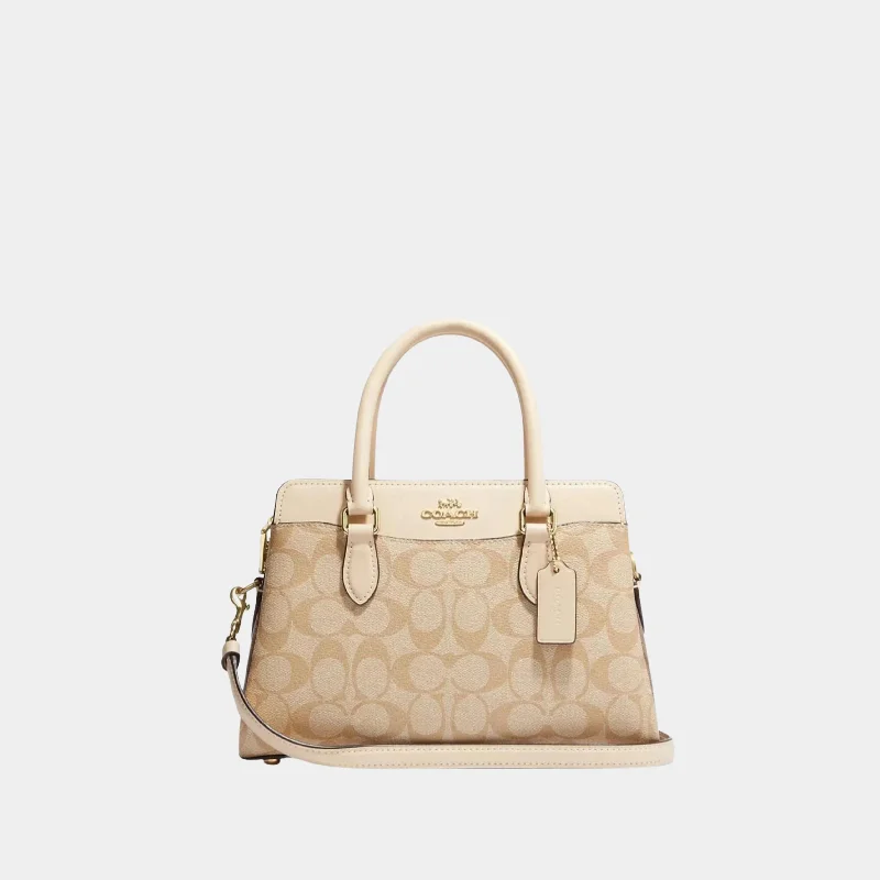 Coach tote bags with a spacious interior and multiple compartments for organizationCoach Mini Darcie Carryall In Signature Canvas