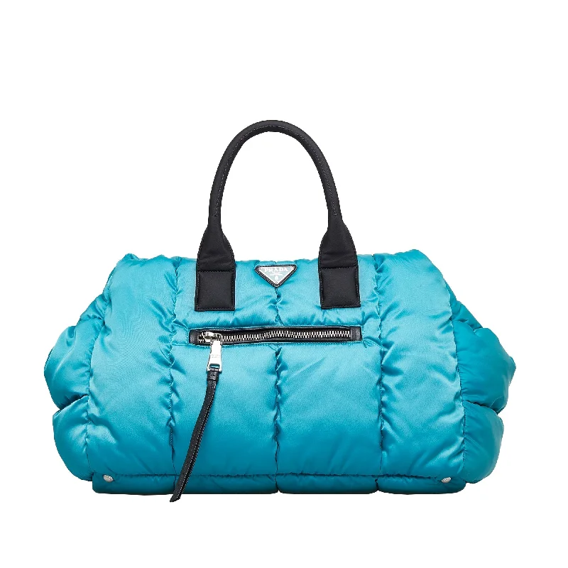 Prada Cleo bags with a snakeskin - effect panel for a bold and trendy lookPrada Tessuto Bomber Blue Nylon