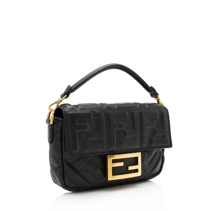 Fendi crossbody bags with a woven leather strap for a unique texture and visual appealFendi FF Embossed 1974 Mini Baguette Shoulder Bag (SHF-st6LPG)