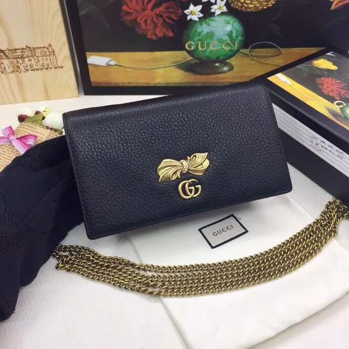 Women Gucci bags with a snap - button closure and a decorative charmGucci Bags