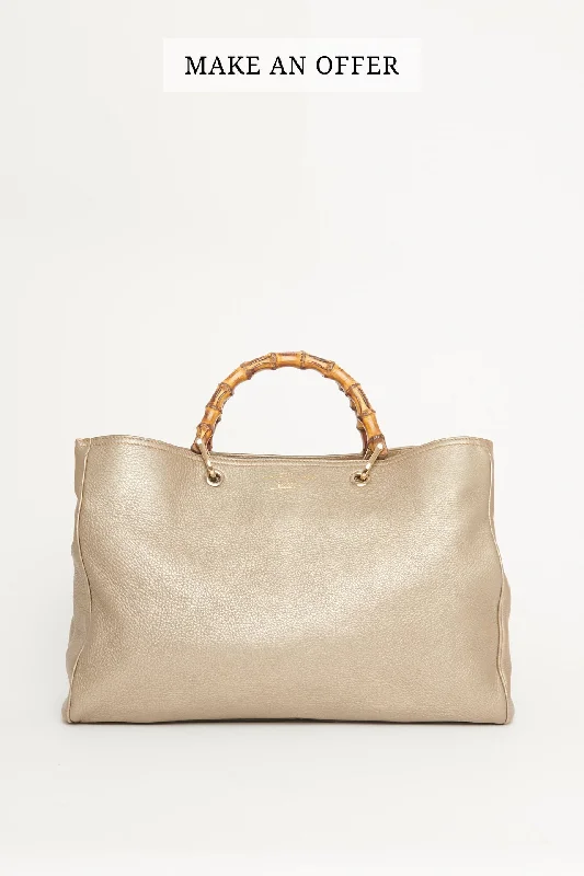 Women Gucci Sylvie bags with a detachable ribbon detailGolden Beige Leather Preowned Bamboo Tote