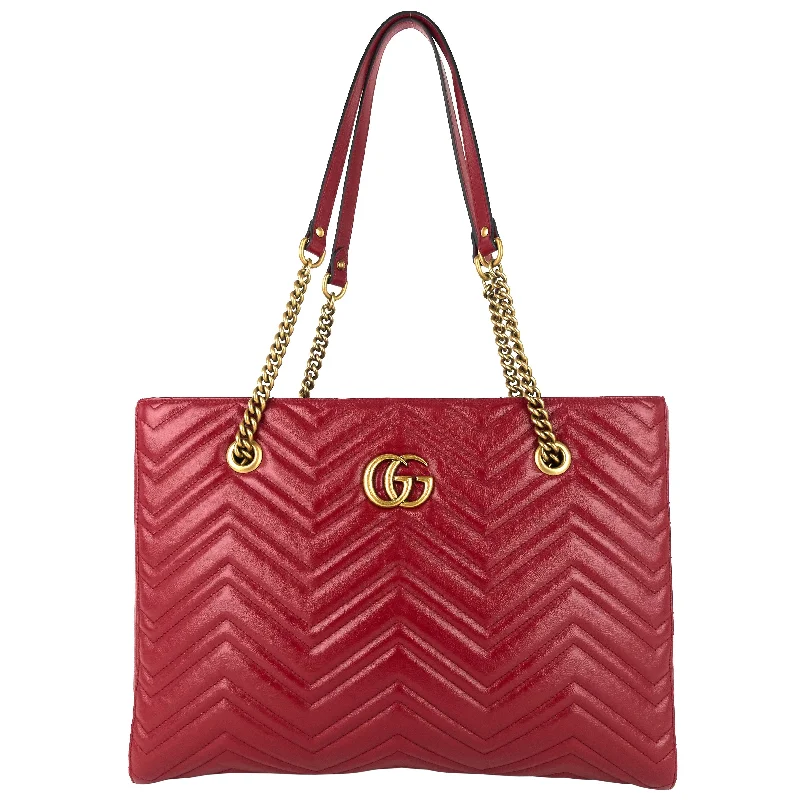 Gucci Marmont bags for women with a contrast - colored interiorGG Marmont Medium Matelassé Leather Tote Bag