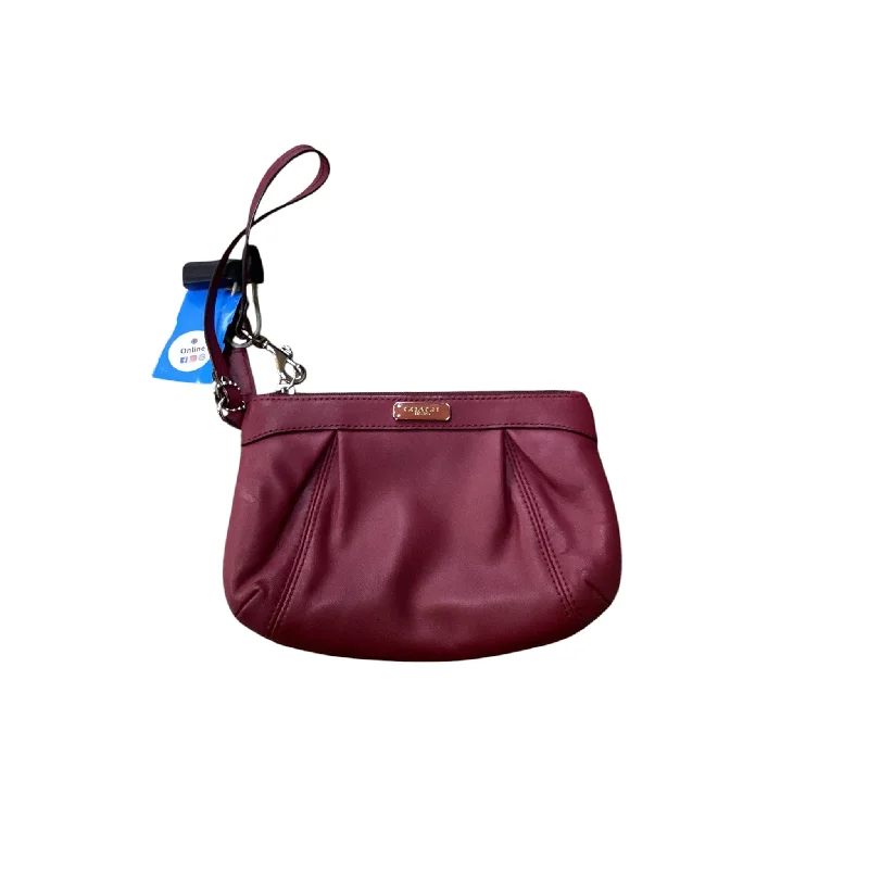 Coach Borough bags with a structured silhouette and a magnetic - snap closureWristlet Designer By Coach, Size: Small