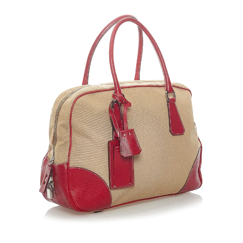 Ladies Prada Galleria bags with gold - toned hardware for a luxurious touchPrada Canapa Bauletto Canvas Tote Bag 33400