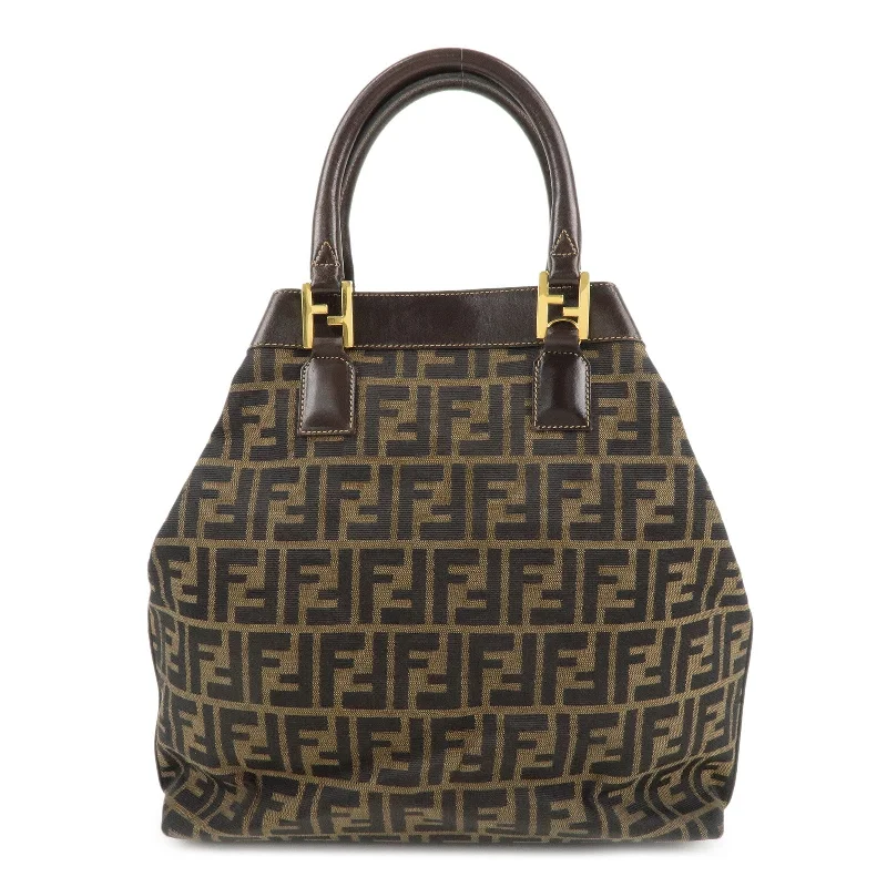 Fendi Baguette bags with a studded leather trim for a bold and edgy lookFENDI Zucca Cnavas Leather Hand Bag Tote Bag 15385