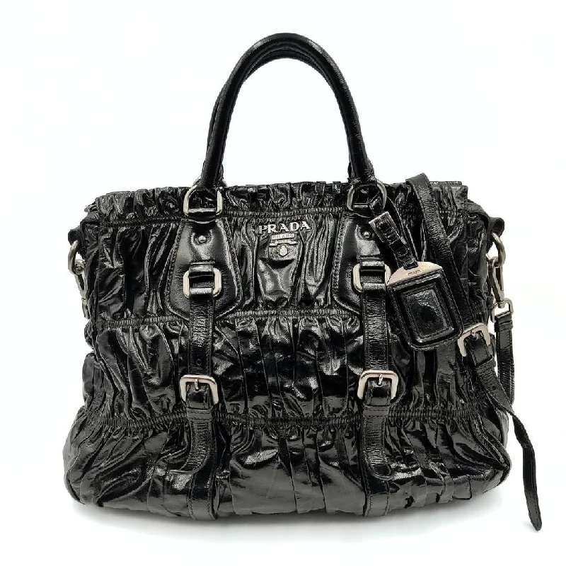 Prada Cleo bags with a detachable coin purse for added functionalityPRADA Shopper shoulder bag in black Gaufre paint