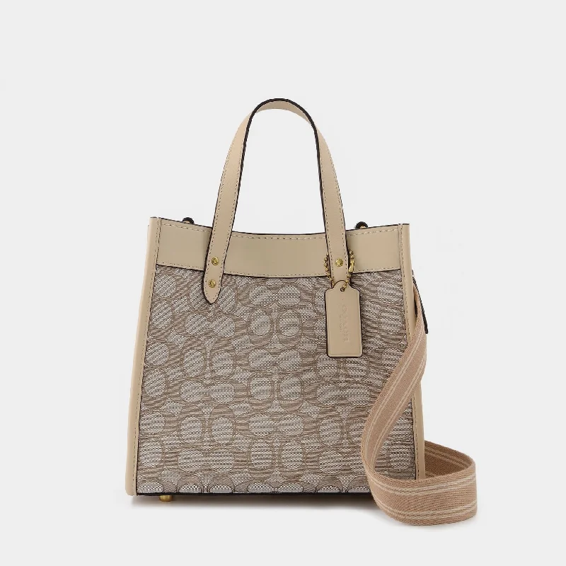 Ladies Coach crossbody bags with a wide - width strap for comfortField Tote 22 Tote Bag - Coach - Stone Ivgoldy - Jacquard