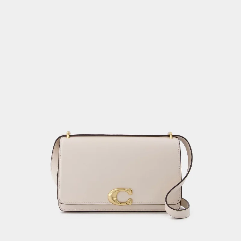 Coach Rogue bags with a detachable shoulder strap for versatile carryingBandit Shoulder Bag - Coach - Ivory - Leather