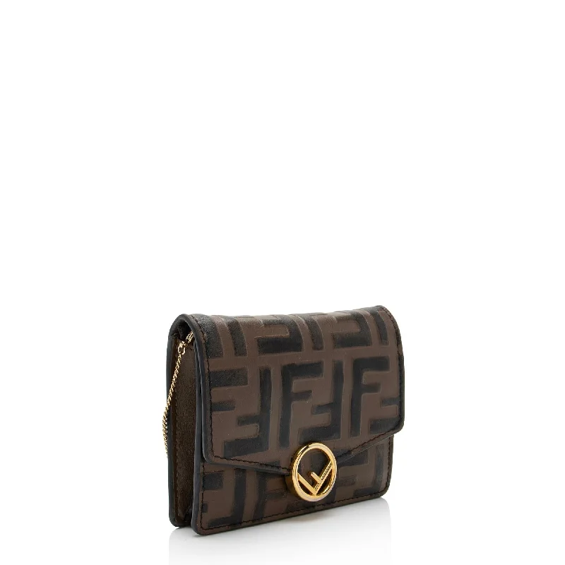 Fendi bags with a patent - leather finish for a shiny and sophisticated appearanceFendi FF Embossed 1974 Mini Crossbody Bag (SHF-NZatLn)