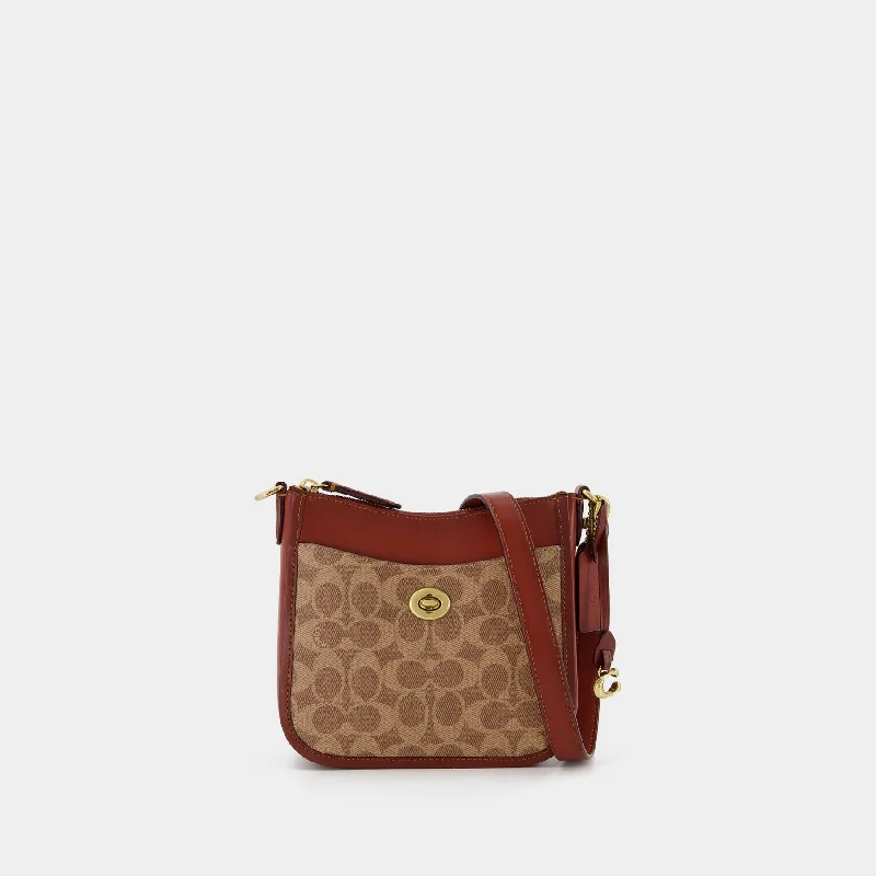 Coach crossbody bags in a vibrant, eye - catching color for a bold statementChaise 19 Crossbody - Coach - Tan Rust - Canva