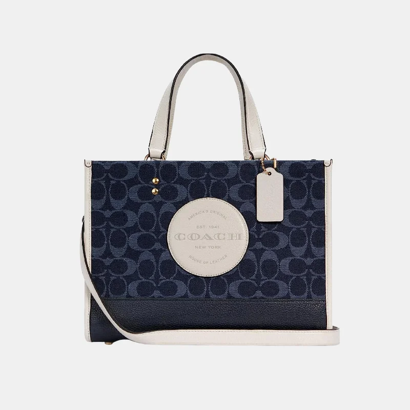 Coach Dempsey bags with a crystal - embellished C - logo for added luxuryCoach Dempsey Tote  In Signature Denim With Coach Patch