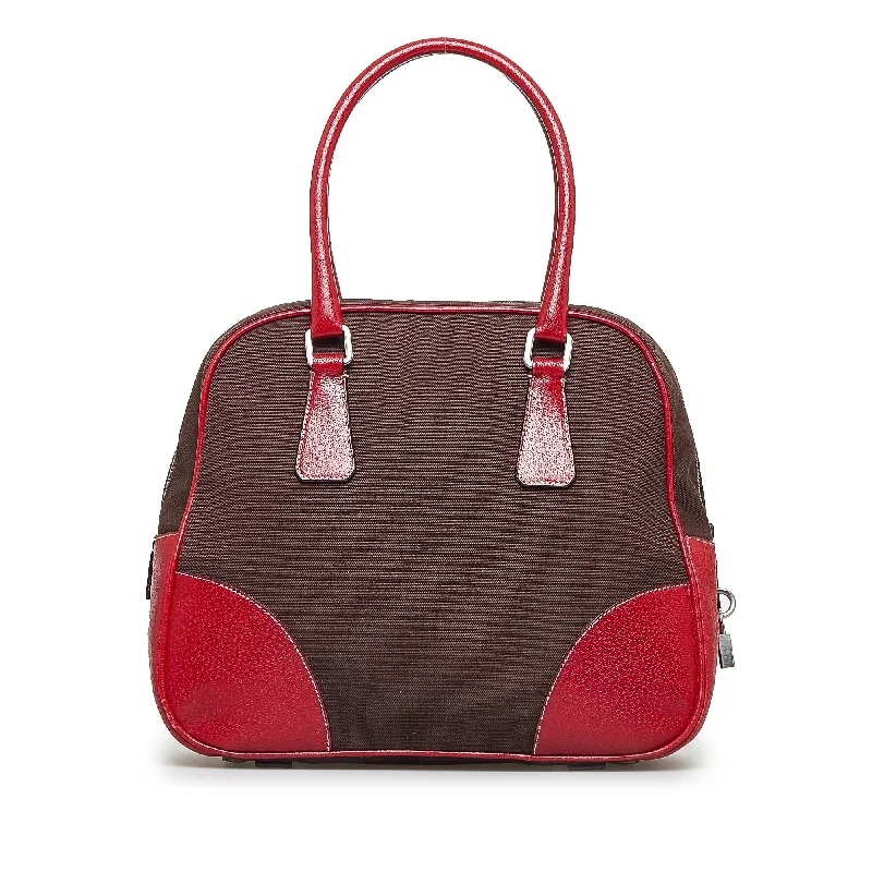 Small - sized Prada Saffiano leather bags for a compact and stylish carryPrada Canapa Bauletto axKL4A