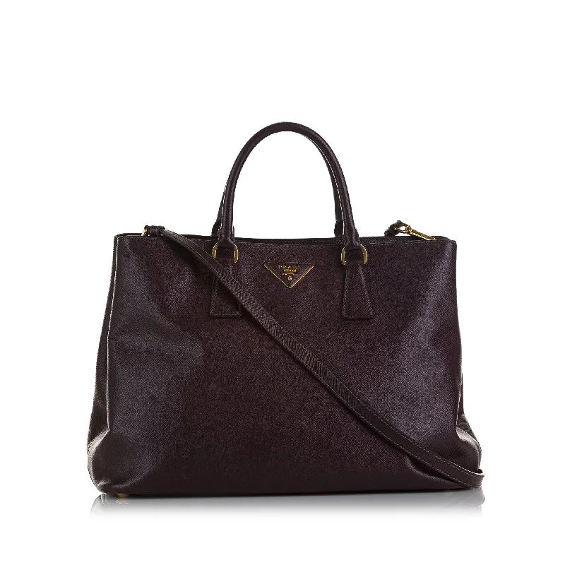 Prada Cleo bags with a curved shape and a chain - link shoulder strapPrada Cuir Twin Handbag Brown Saffiano