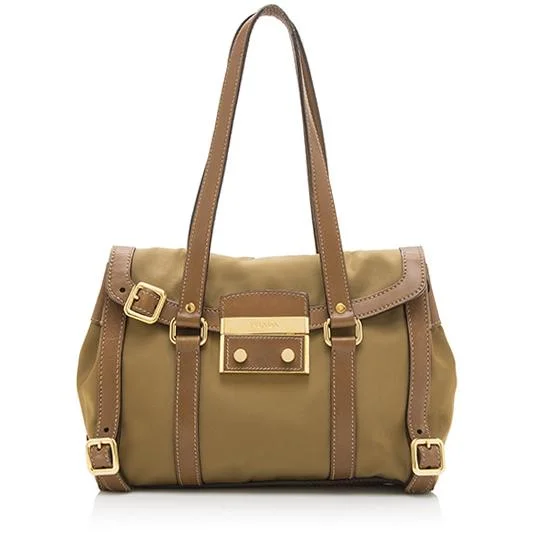 Prada Cahier bags with a monogram - embossed leather surfacePrada Tessuto Leather Pushlock Tote