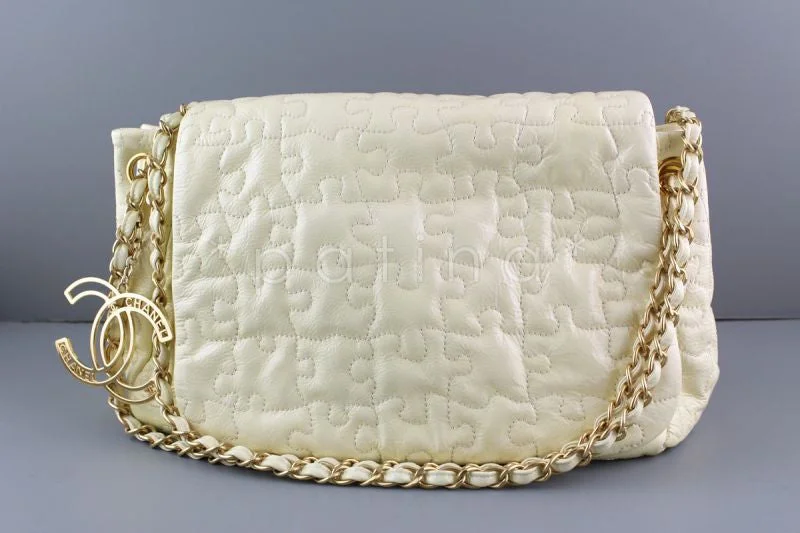 Chanel Handbag with Adjustable Strap for ComfortChanel Ivory Jumbo Patent Puzzle Flap CC Charm Bag