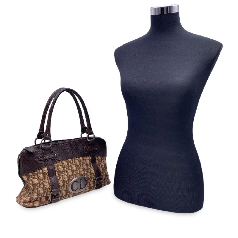 Christian Dior Saddle bags with a studded trim for a bold lookCHRISTIAN DIOR Brown Logo Oblique Canvas Satchel Shoulder Bag