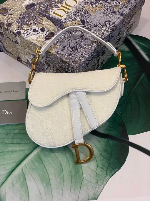 Christian Dior tote bags with a double - handle and shoulder - strap optionChristian Dior Saddle Bag White Oblique Embroidered Canvas Gold Toned Hardware